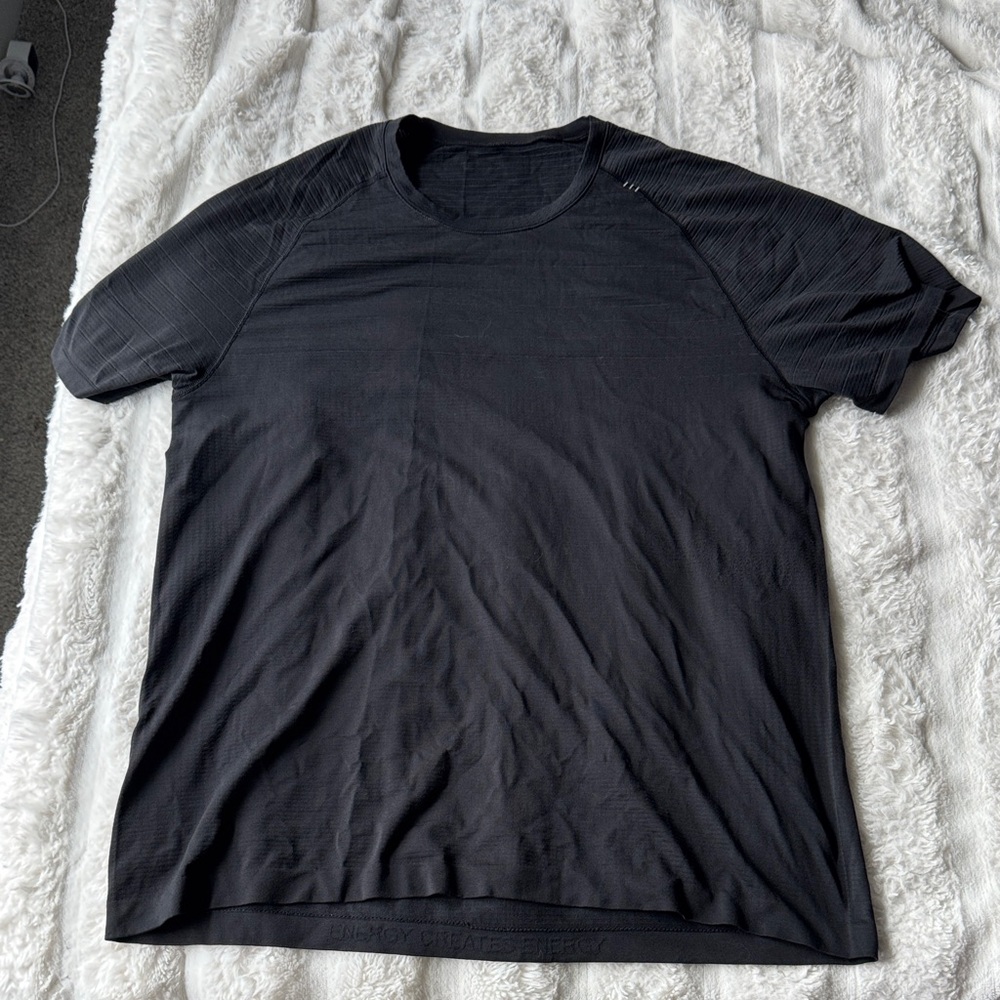 Lululemon Metal Vent Glow Shirt (glow means reflecting stripes on chest)